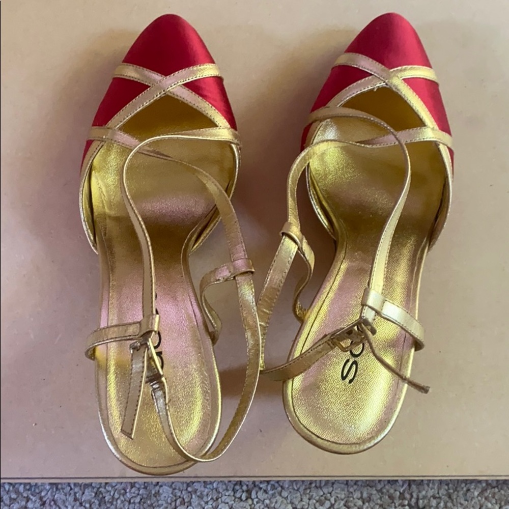 “Sacco” gold and red heels.